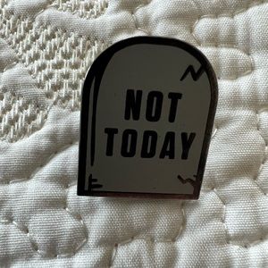 Not today Satan pin I bought in Brooklyn a few years ago.